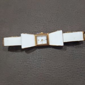 Kate Spade White Carlyle enamal Bow bangel Watch.